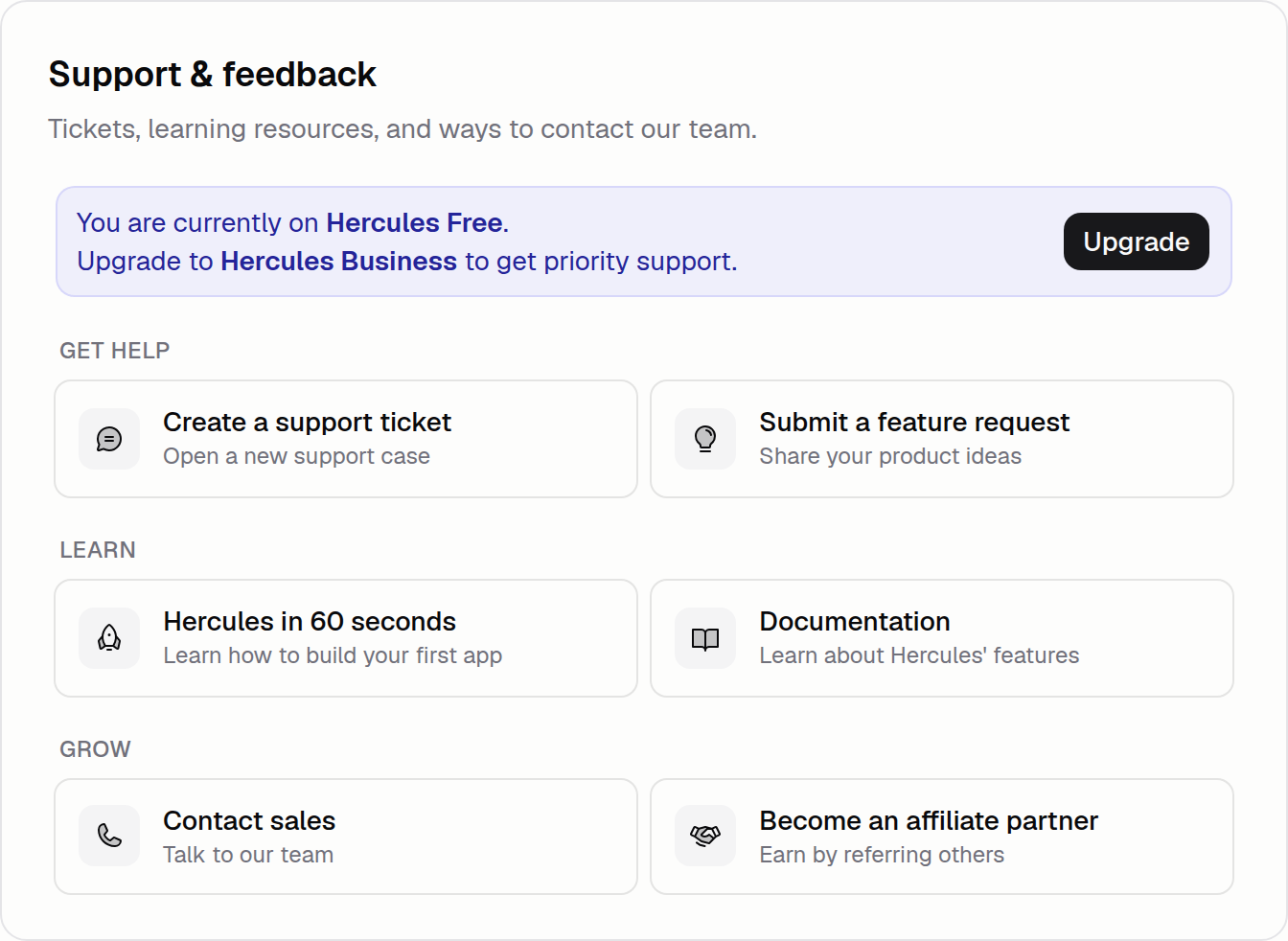 Support and feedback hub with cards for opening a ticket, learning resources, and feature requests